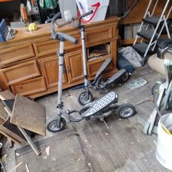 Two Stair Stepping Exercise Bikes