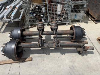 Heavy duty trailer axles 25k weight rating drop axles all new brake shoes and drums selling complete