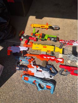 Box of nerf guns and accessories
