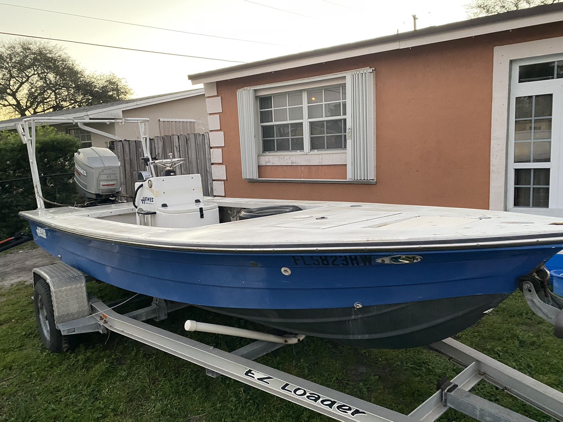 Hewes flats boat powered by 200hp merc