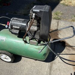Air compressor, With 25ft Long Hose, chainsaw, 3 ton low profile car jack and rolling seats and creeper for sale