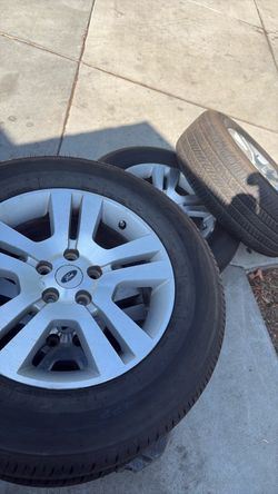 [LIKE NEW] Set of 4 Ford Bridgestone tires