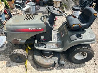 Craftsman riding lawn mower powered by a 17.5 horsepower Kohler OHV (Overhead Valve) engine.