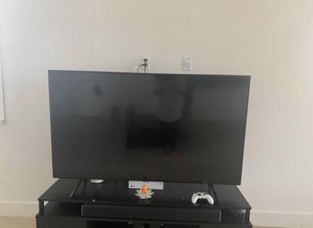Samsung 65" QLED TV, TV unit, Sound Bar, and Woofer