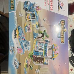 Exercise and play 948 pc vacation tour building blocks new sealed box but does have the front dented
