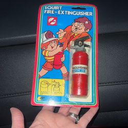 VINTAGE, ORIGINAL - SQUIRT FIRE-EXTINGUSHER TOY, MADE IN HONG KONG. Corners are bent
