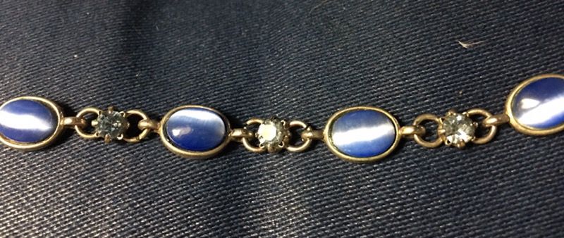 Bracelet blue moon stone type stone and round clear blue stones