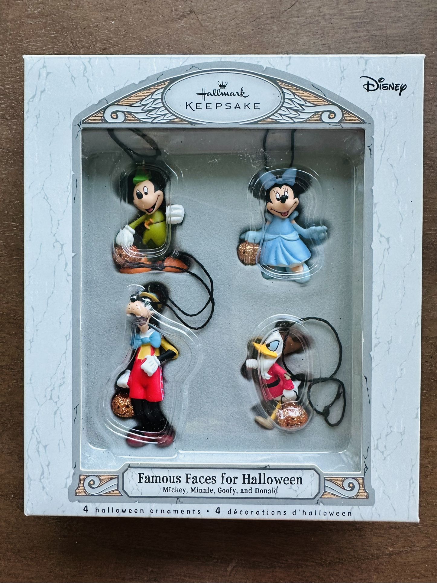 Hallmark 2007 Disney Famous Faces for Halloween mini ornament Set of 4 Mickey, Minnie, Goofy ,Donald.  Like new in original Box 