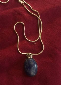 Silver chain with blue pendant