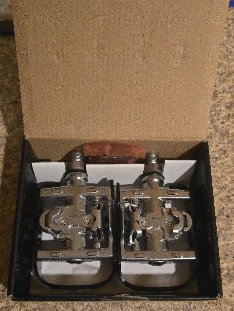 Brand new Forte Flat/Clipless Pedals (Silver/Black) (w/ Cleats) (Dual-Purpose)
