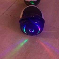 Hover Board, Goes 10 Mph And Led Lights On The Wheels And On The Steps.