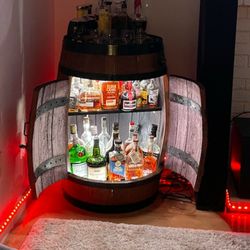 Custom Wine Barrel Liquor Cabinets.  $8000. Located In Oakdale 