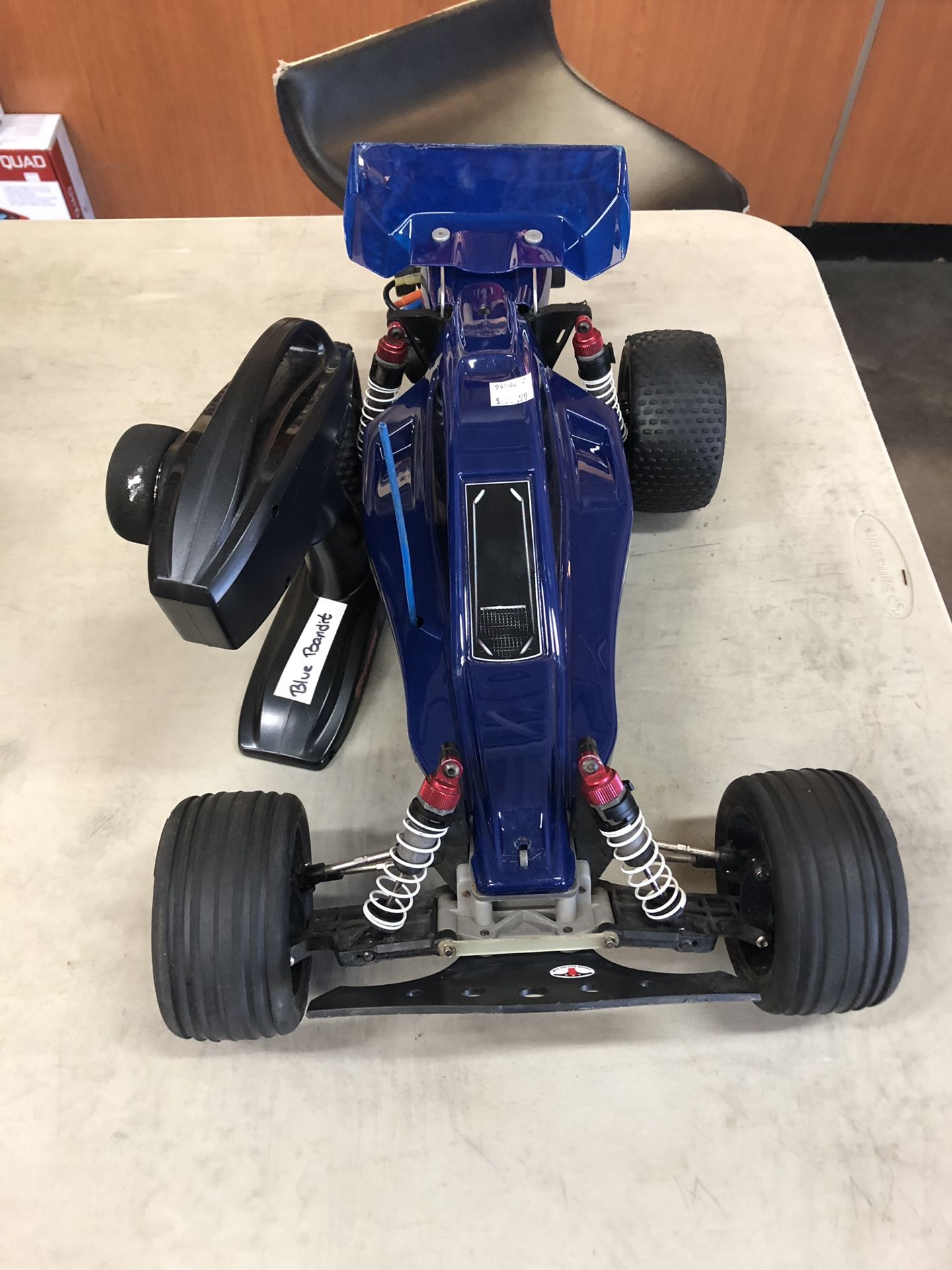 Used traxxas bandit rc buggy remote control car blue brushless w wheelie bar and remote