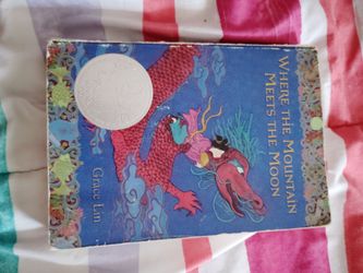 paperback book where the mountain meets the moon