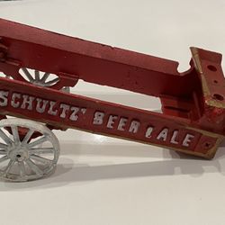 VINTAGE SCHULTZ BEER AND ALE CAST IRON DELIVERY TOY WAGON 