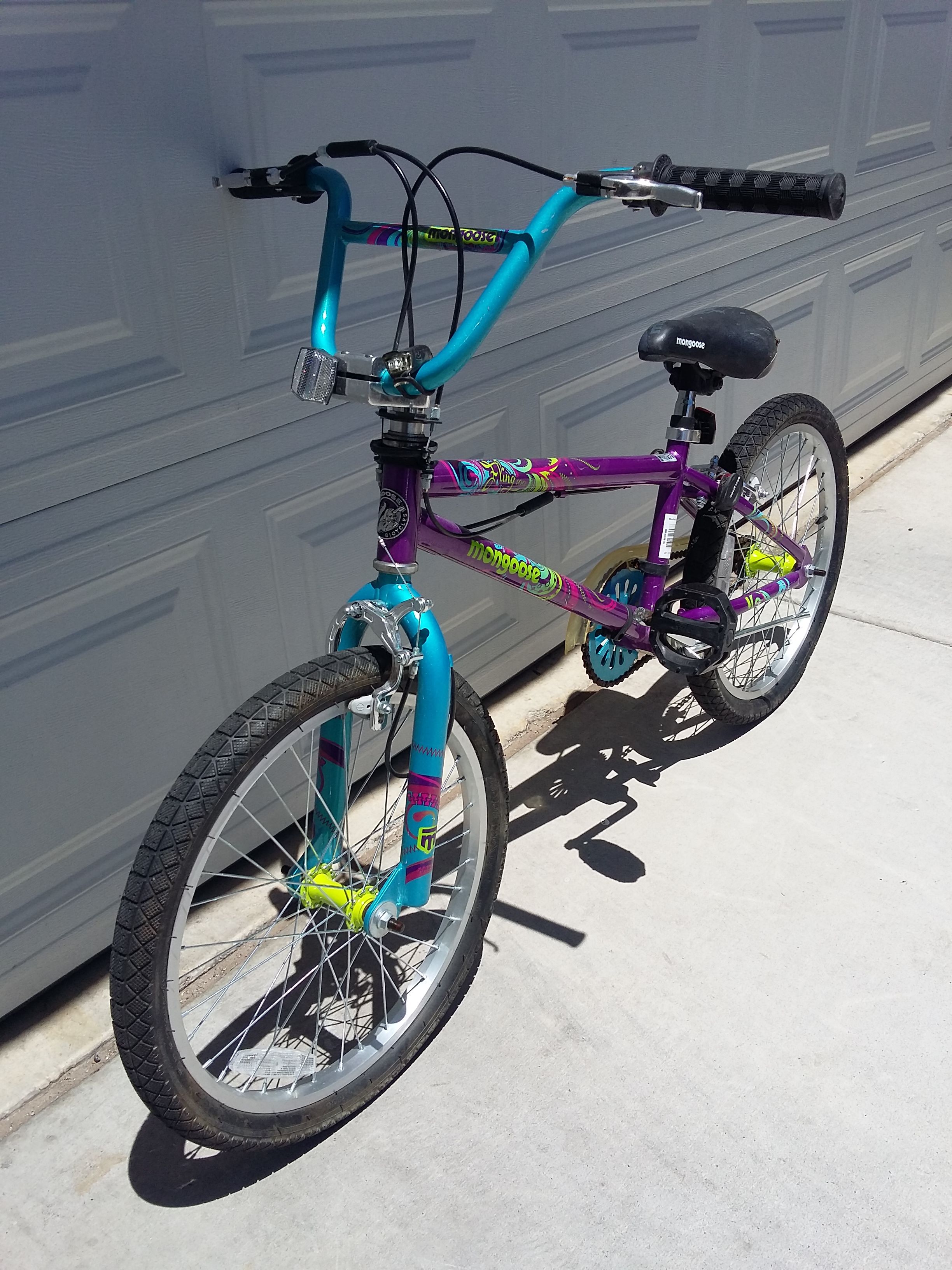20" Mongoose fling 100 girls purple freestyle bike