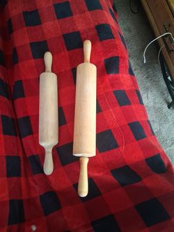Large rolling pin .one smaller antique
