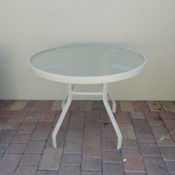 Preowned aluminum glass patio table