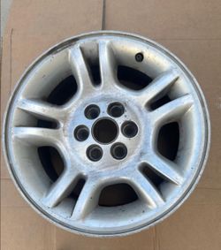 16"x8" OEM wheel rim designed for 2001-2004 Dodge Dakota trucks and Dodge Durango SUVs.