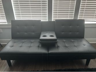 Black Faux Leather Futon Couch (w/ 2 cup holders and usb port)