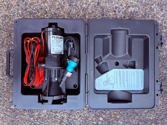 Unused FloJet Portable RV Waste Macerator Pump
