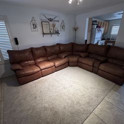 Sectional three-piece couch with recliners and bed