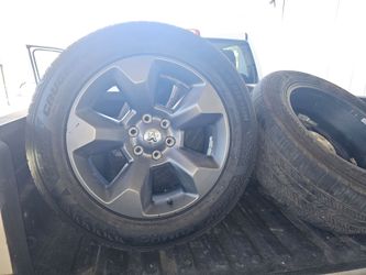 Ram 1500 set of rims and tires