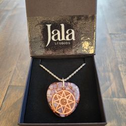 Heart Orgonite Pendant Lepidolite Copper EMF Protection Energy Jewelry

This handcrafted Heart Orgonite Pendant combines the calming energy of Lepidol
