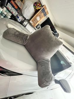 Back rest pillow with arms