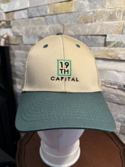 Trucker hat w/embroidered logo for 19th Capital Group beige green cap