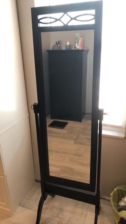 Tilting mirror stand