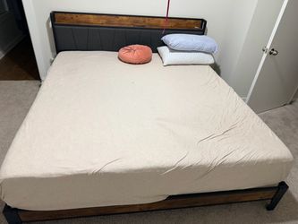 California king bedrame with mattress, pillows and bedsheet