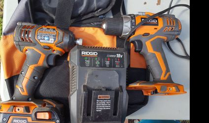 RIDGID IMPACT AND DRILL WITH BATTERY AND Charger AND BAG