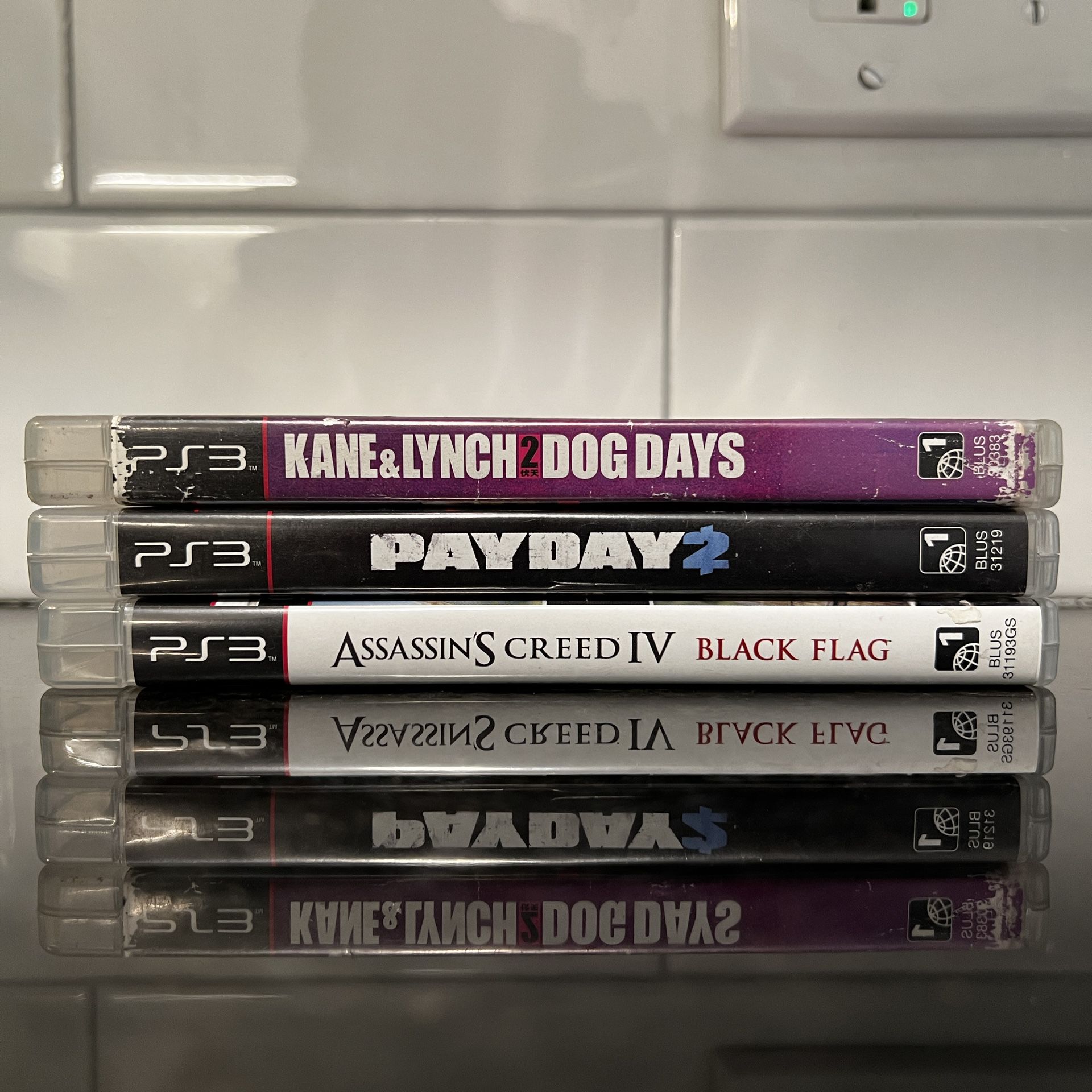Ps3 Game Lot Assassin’s Creed IV, PayDay2, and Kane & Lnych 2