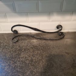 2 vintage cast iron plant hooks that mount to wall. 