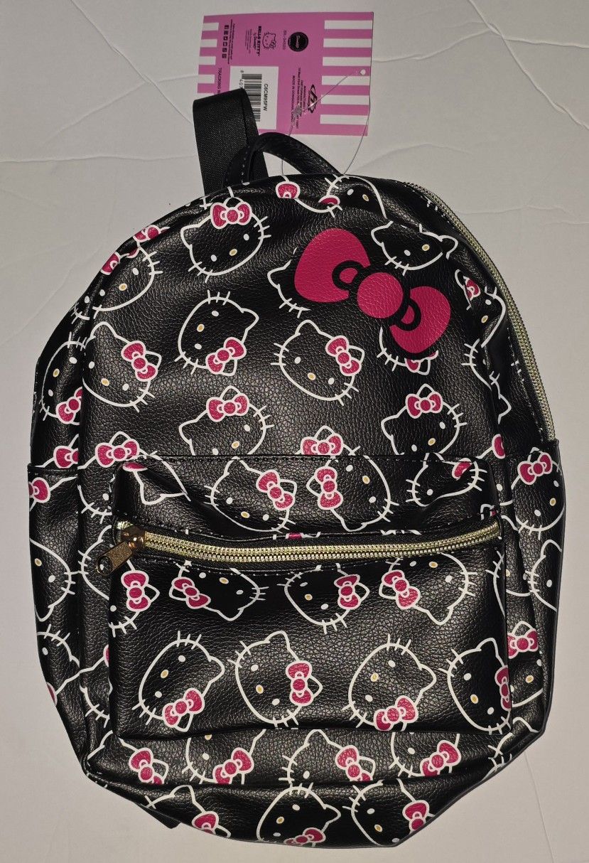 HELLO KITTY MINI BACKPACK PURSE BAG-BOWS ALL OVER PRINT, 10" DELUXE BAG UNISEX