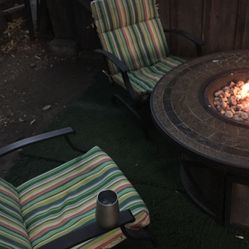 Propane fire table with 4 rocking chairs and cushions 