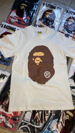 White and brown shirt size medium