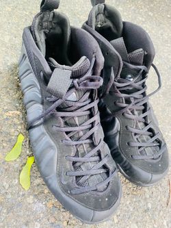 Black Nike form poses