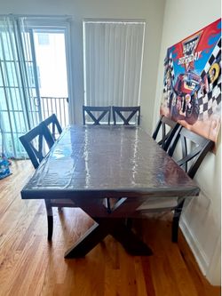 7- Piece Bayside Dark Wooden  Dinning Set.