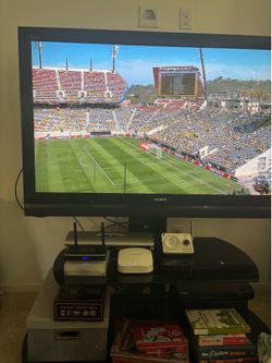 Free Sony brand 56 inch TV & Stand