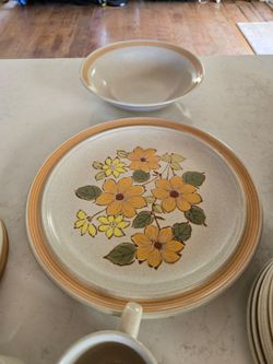 Stoneware dinnerware set + extras