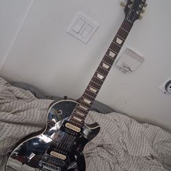 Gibson Les Paul Studio.....w Custom mirrortop.......$2000