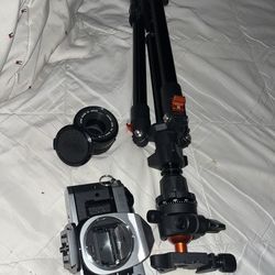 AE-1 program film camera / tripod