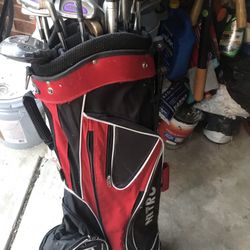A  Gulf Bag Full With  Golf Item To Play  They’re  Pretty  Old Fashioned . They’re  Very Good Quality 