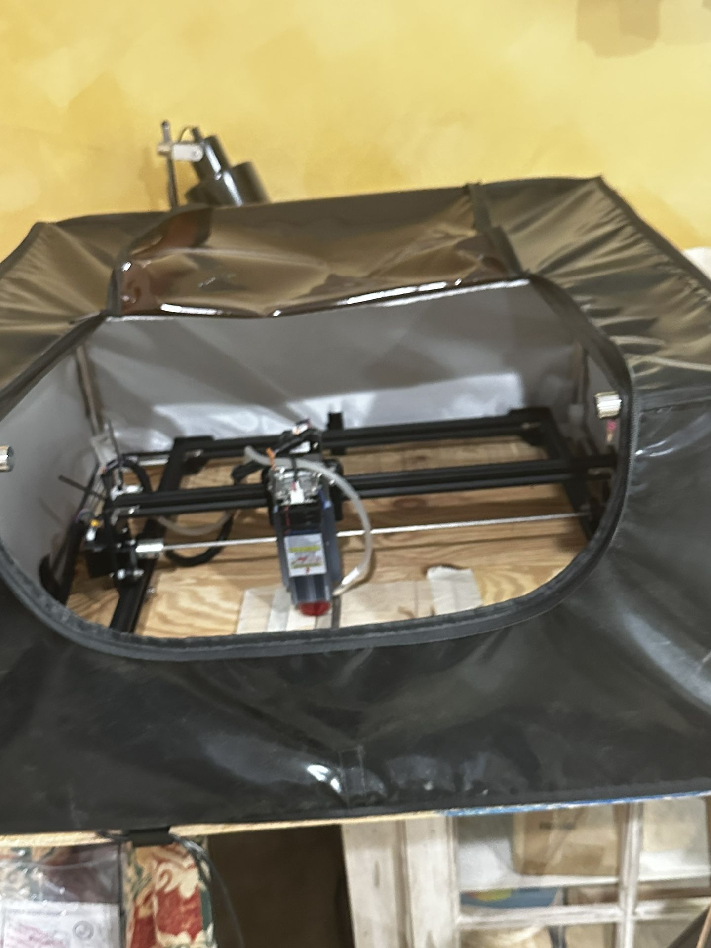 ORTUR Laser Engraver with upgraded Sculfun S9 module, cover, air assist tube installed and rotary.