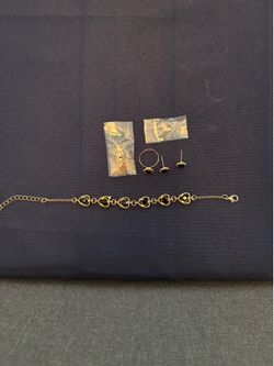 Rose colored, earrings with earring backings. Necklace and ring