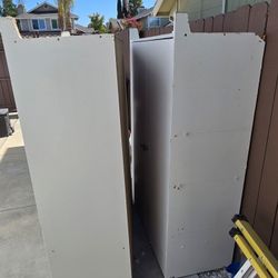 2 Cabinets used...just come take them..you can put them in  a garaje! 