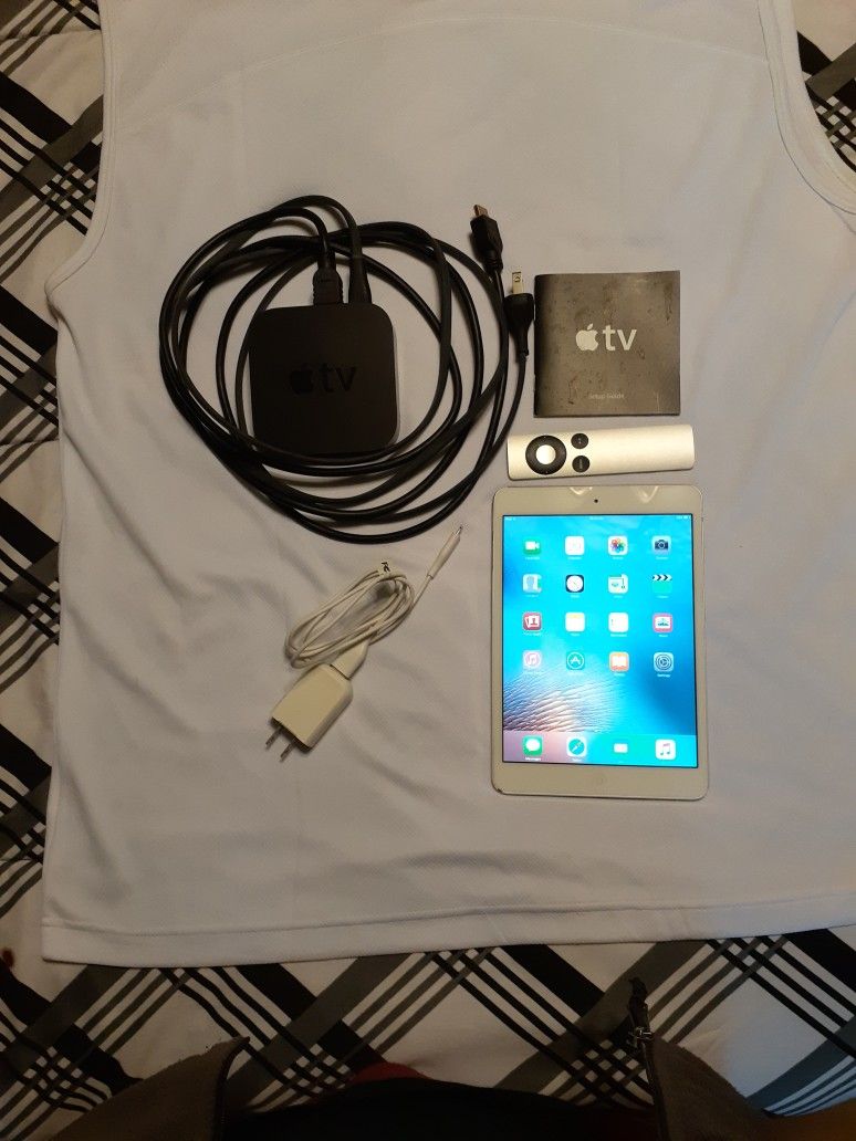 Apple Mini plus Aple TV. With HDMI cable.