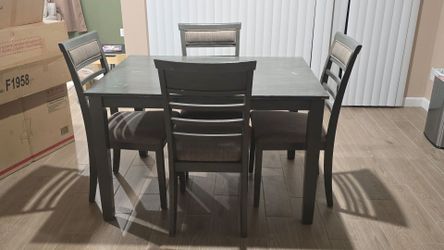 Table and 4 chairs for sale